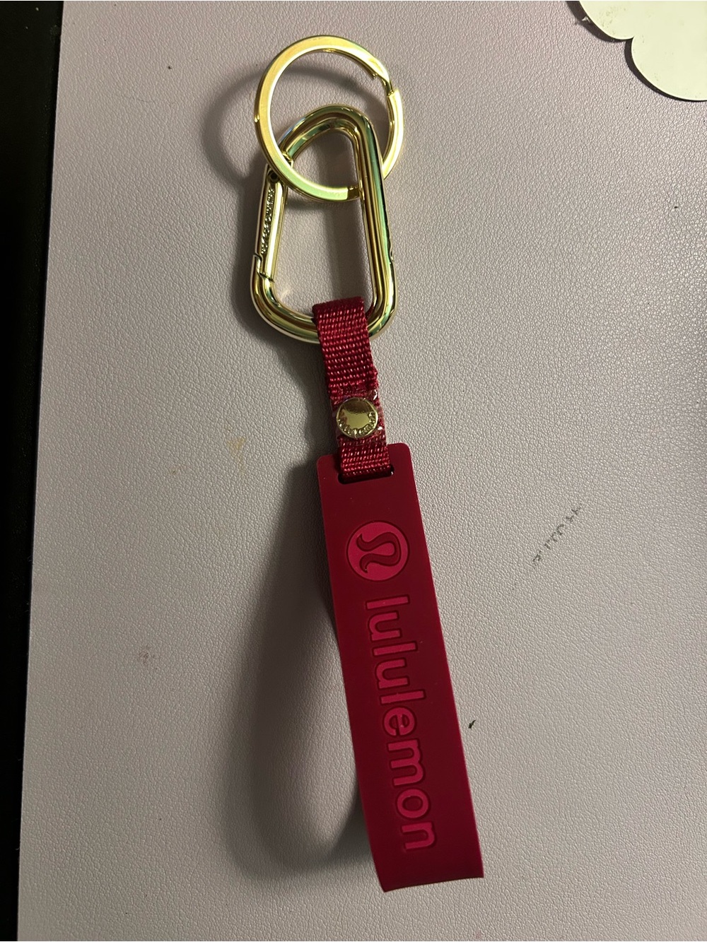 lululemon athletica crimson key and card holder with gold hardware